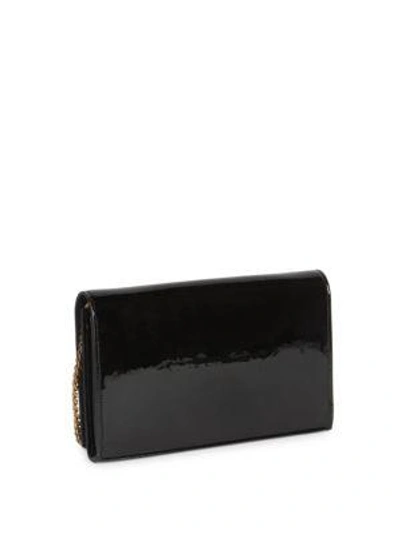 Shop Saint Laurent Patent Leather Chain Wallet In Rouge