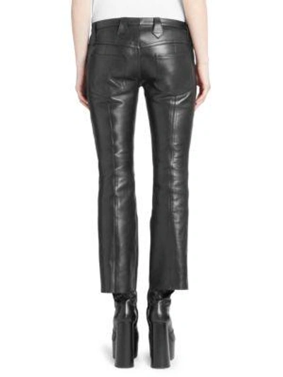 Shop Saint Laurent Cropped Kickflare Leather Pants In Black