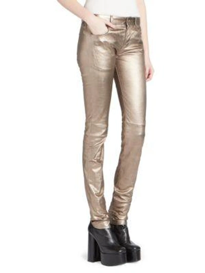 Shop Saint Laurent Mid Rise Metallic Leather Pants In Bronze