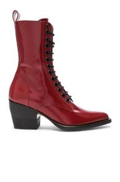 Shop Chloé Chloe Rylee Shiny Leather Lace Up Buckle Boots In Red