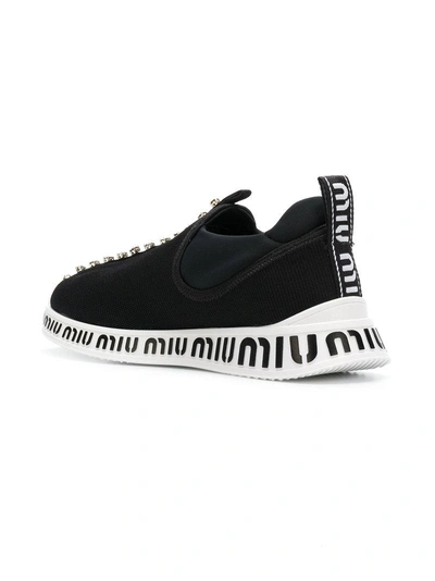 Shop Miu Miu Logo Printed Sneakers  In Black