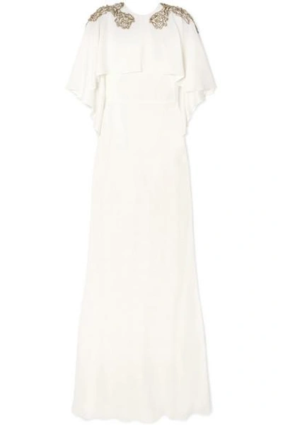 Shop Alexander Mcqueen Cape-effect Embellished Crepe Gown In Ivory