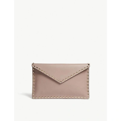 Shop Valentino Poudre Pink Rockstud Grained Leather Envelope Clutch Bag