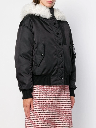 Shop Miu Miu Fur-hooded Bomber Jacket - Black