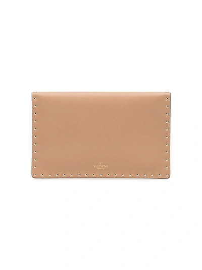 Shop Valentino Beige Rockstud Leather Envelope Clutch - Nude & Neutrals