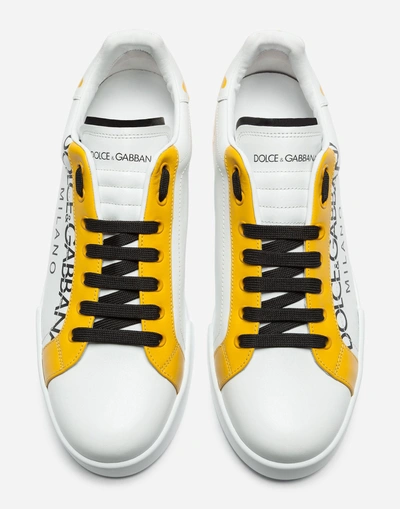 Shop Dolce & Gabbana Portofino Sneakers In Printed Patent Calfskin In White/yellow