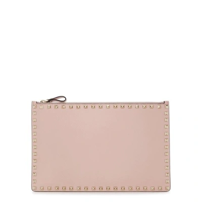 Shop Valentino Rockstud Light Pink Leather Pouch In Pink And Other