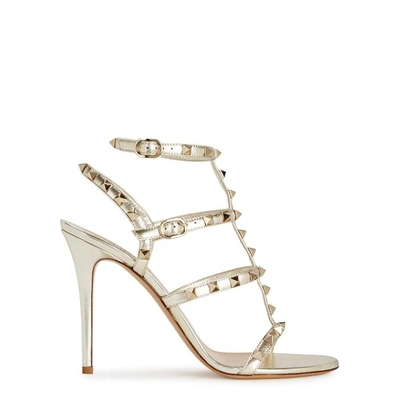 Shop Valentino Rockstud 100 Gold Leather Sandals