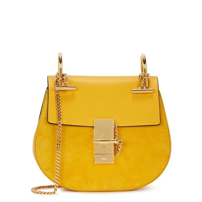 Shop Chloé Drew Mini Yellow Saddle Bag