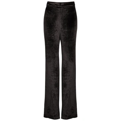 Shop Rebecca Vallance Kara Flared Velvet Trousers In Black