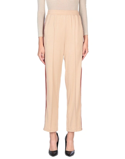 Shop Ganni Casual Pants In Sand