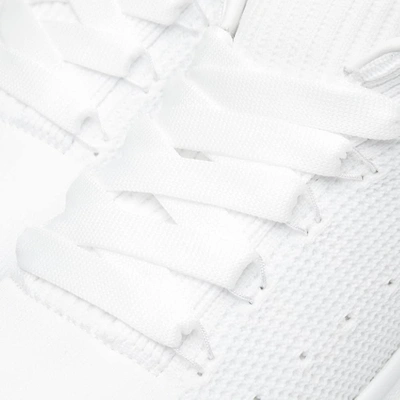 Shop Alexander Mcqueen Wedge Sole Knit Sneaker In White