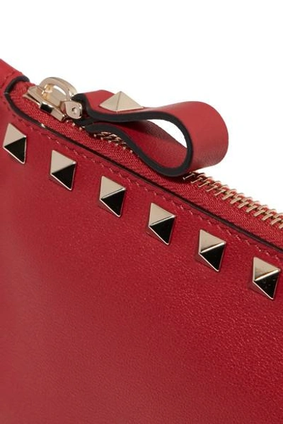 Shop Valentino Garavani The Rockstud Textured-leather Pouch In Red