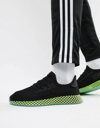 Shop Adidas Originals Deerupt Sneakers In Black B41755 - Black