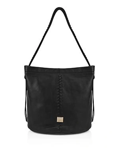 Shop Kooba Limon Leather Bucket Bag In Black/gold