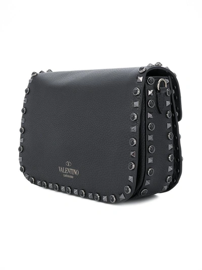 Shop Valentino Garavani Rockstud Rolling Shoulderbag In Black