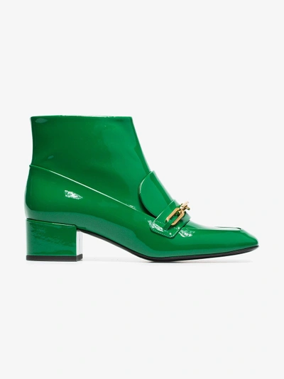 Shop Burberry Link Detail Patent Leather Ankle Boots In Green