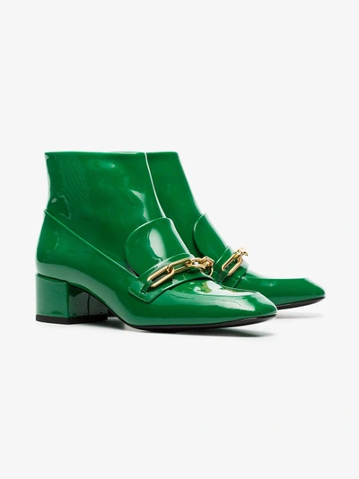 Shop Burberry Link Detail Patent Leather Ankle Boots In Green
