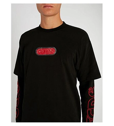 Shop Gcds Logo-detail Cotton-jersey Long-sleeved T-shirt In Black