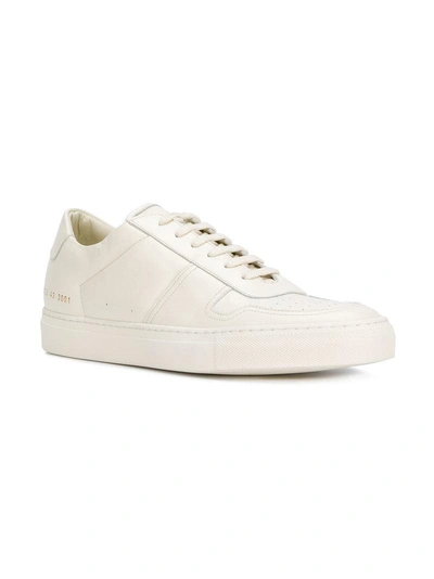 Shop Common Projects Bball Low Sneakers In White