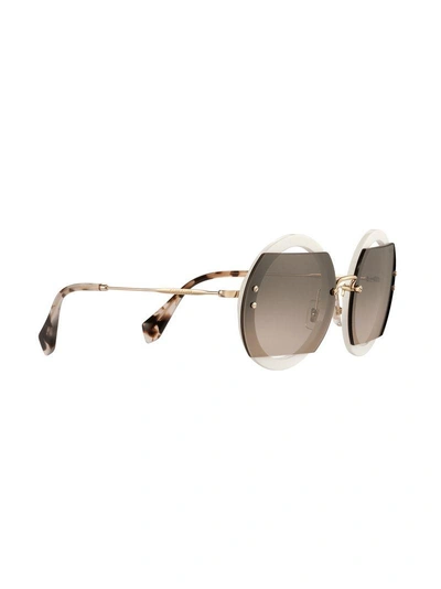 Shop Miu Miu Reveal Sunglasses In Grey