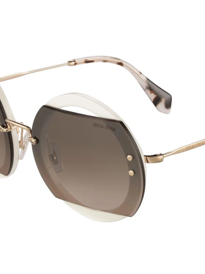 Shop Miu Miu Reveal Sunglasses In Grey