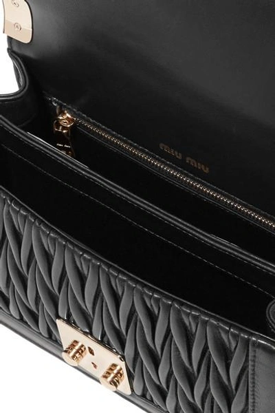 Shop Miu Miu Matelassé Leather Shoulder Bag In Black