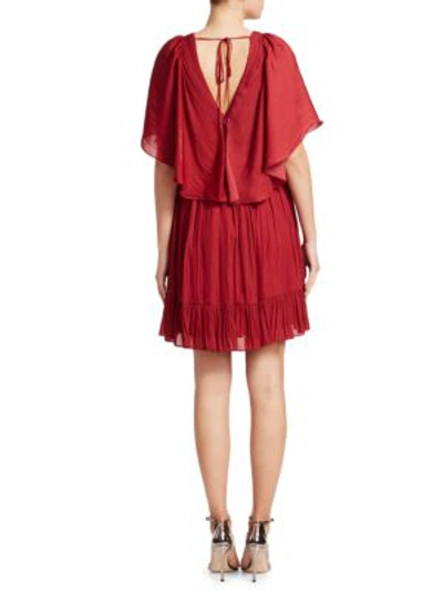 Shop Halston Heritage Flowy Cape-sleeve Pleated Dress In Currant