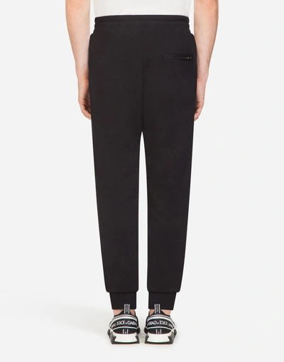 Shop Dolce & Gabbana Cotton Jogging Pants With Designers' Patches In Black