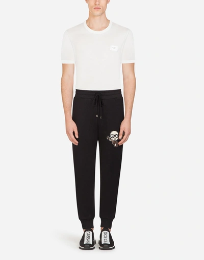 Shop Dolce & Gabbana Cotton Jogging Pants With Designers' Patches In Black