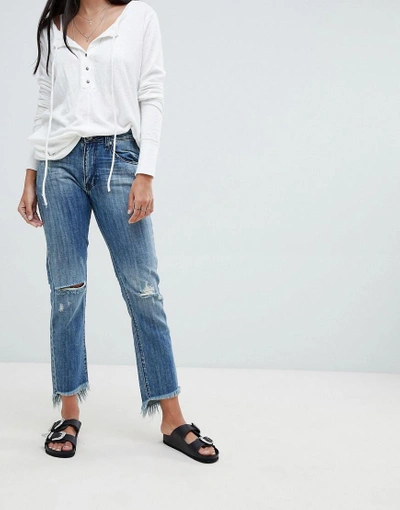Shop One Teaspoon High Waist Straight Jeans With Rips And Raw Hem-blue