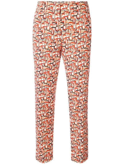 Shop Prada Abstract Print Trousers - Yellow & Orange