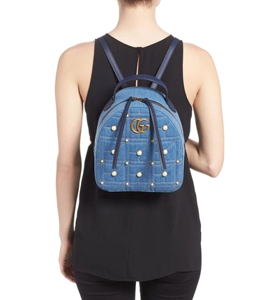 Shop Gucci Gg Marmont 2.0 Imitation Pearl Embellished Denim Backpack - Blue In Denim Blue