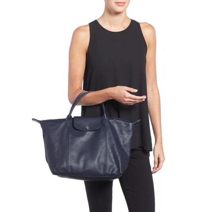 Shop Longchamp Medium 'le Pliage Cuir' Leather Top Handle Tote - Blue In New Navy