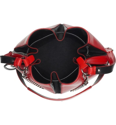 Shop Alexander Mcqueen Leather Bucket Bag - Red In Lust Red/ Black