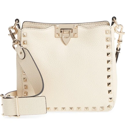 Shop Valentino Rockstud Mini Hobo Crossbody Bag In Ivory