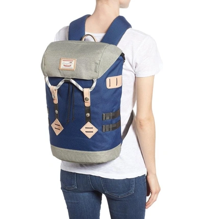 Shop Doughnut Small Colorado Water Repellent Backpack - Blue In Navy/ Beige