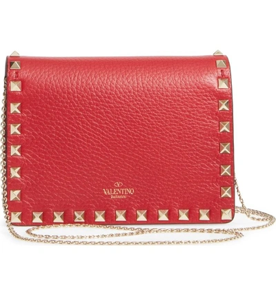 Shop Valentino Rockstud Leather Pouch Wallet On A Chain In Rossa