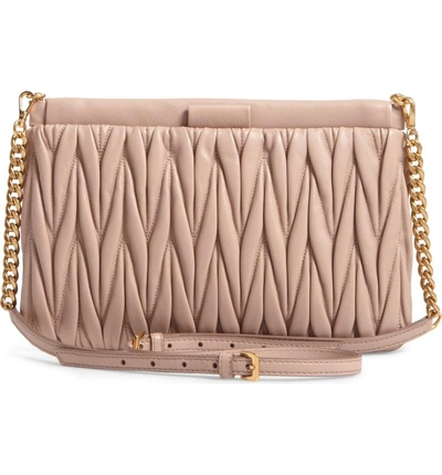 Shop Miu Miu Matelassé Leather Clutch In Cammeo