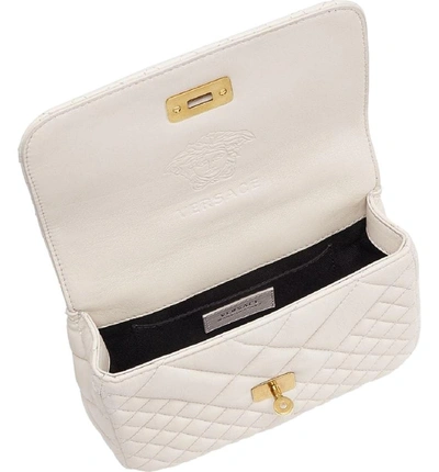 Shop Versace Icon Quilted Leather Crossbody Bag - White In Off White