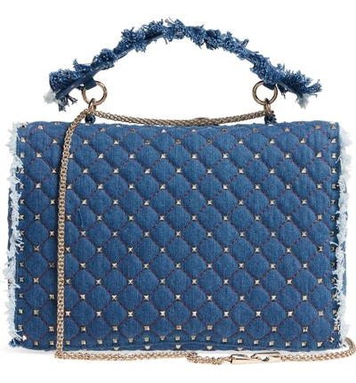 Shop Valentino Maxi Rockstud Spike Denim Shoulder Bag - Blue