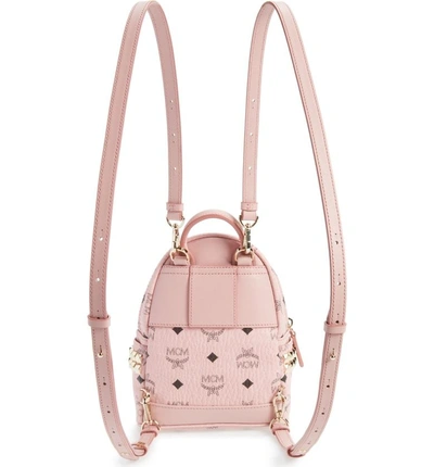 Shop Mcm 'x-mini Stark Side Stud' Convertible Backpack In Soft Pink