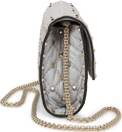 Shop Valentino Rockstud Spike Quilted Leather Shoulder Bag - Grey In Pastel Grey