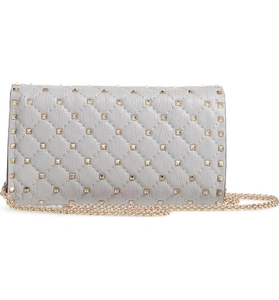 Shop Valentino Rockstud Spike Quilted Leather Shoulder Bag - Grey In Pastel Grey