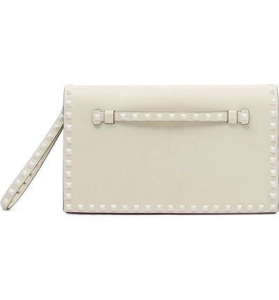 Shop Valentino Rockstud Calfskin Leather Clutch - Ivory