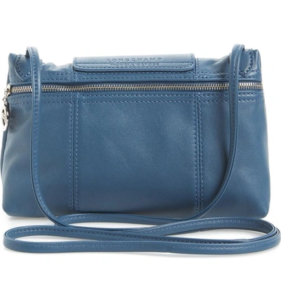 Shop Longchamp Le Pliage - Cuir Crossbody Bag - Blue In Pilot Blue