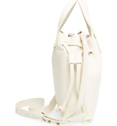 Shop Madewell Mini Drawstring Transport Leather Tote - White In Vintage Canvas