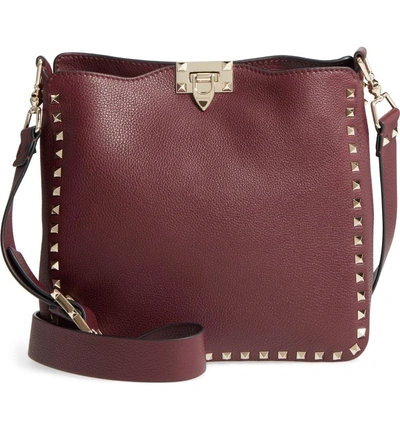 Shop Valentino Small Rockstud Leather Hobo - Red In Vinaccia