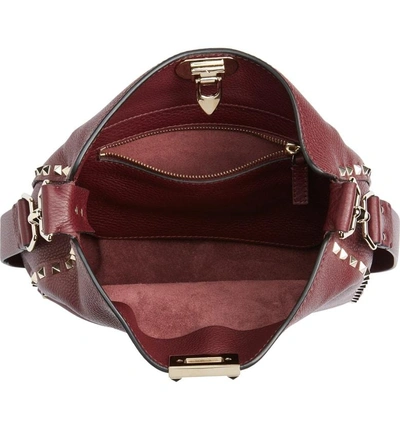 Shop Valentino Small Rockstud Leather Hobo - Red In Vinaccia