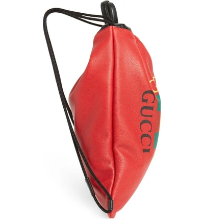 Shop Gucci Logo Drawstring Leather Backpack In Hibiscus Red/ Nero/ Vert